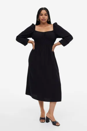 Balloon-sleeved smocked dress